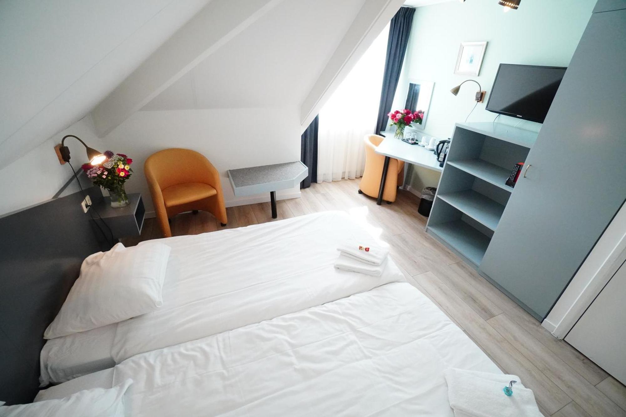 Hotel Den Burg Szoba fotó