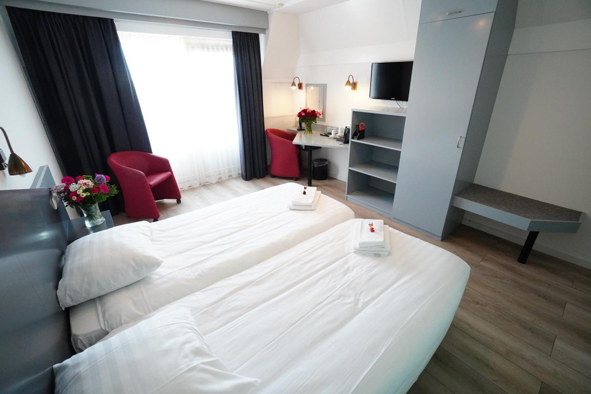 Hotel Den Burg Szoba fotó